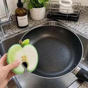 Customer using fruit scrubber on cookware